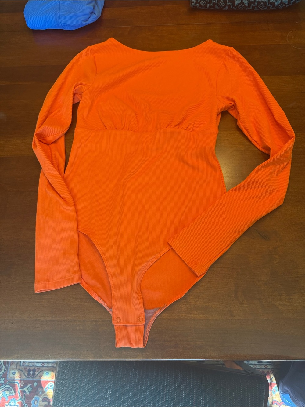 girlfriend collective Kids Long-Sleeve One-Piece Bodysuit in Bright Orange